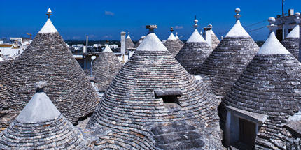 Discover whitewashed trulli in Puglia